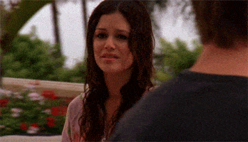 Gif of Summer from The OC tearfully waving goodbye