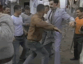 Gif of Borat dancing with a man